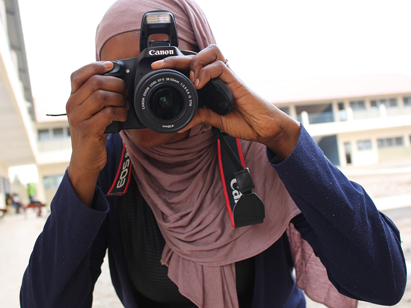 Student with camera